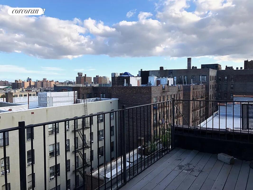 764 St Nicholas Avenue, Unit PH Manhattan, NY 10031 - Photo 8 of 14 a view of city from a roof deck