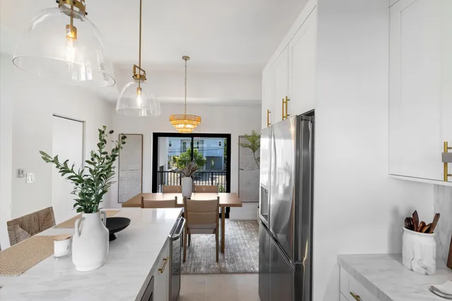 a kitchen with a stove a refrigerator and a stove