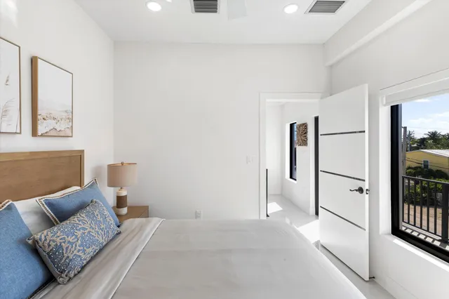 a bathroom with a toilet sink and shower