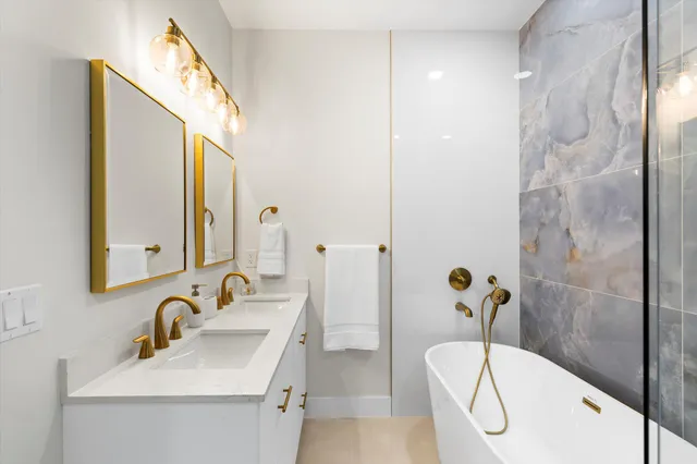 a bedroom with a bed and white wall