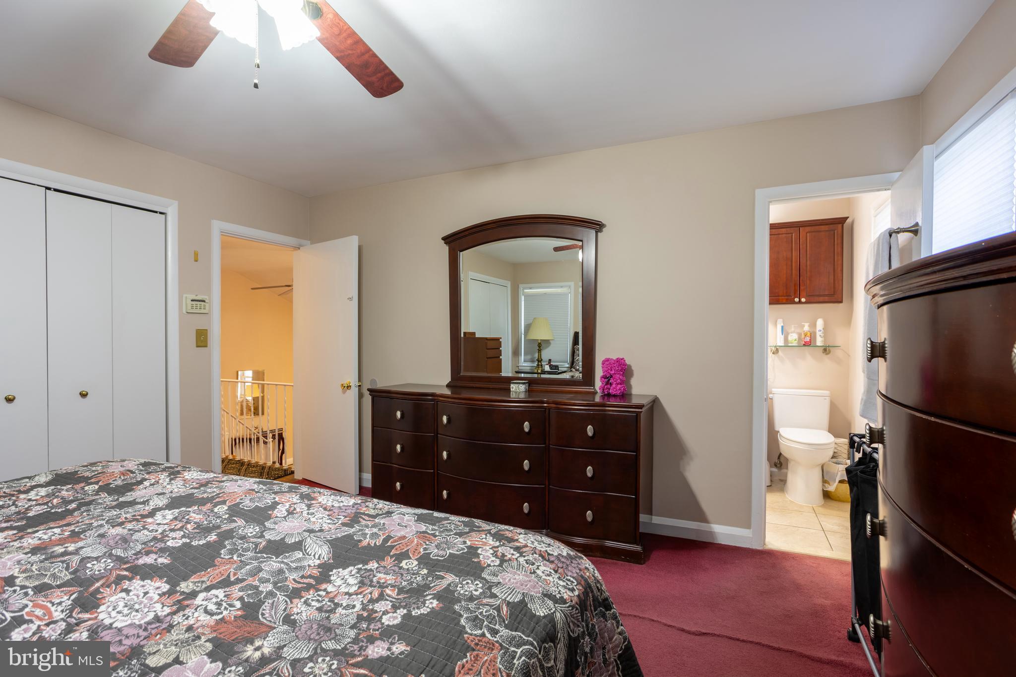 3215 Northbrook Road Baltimore, MD 21208 - Photo 19 of 50 a bedroom with a bed and a dresser