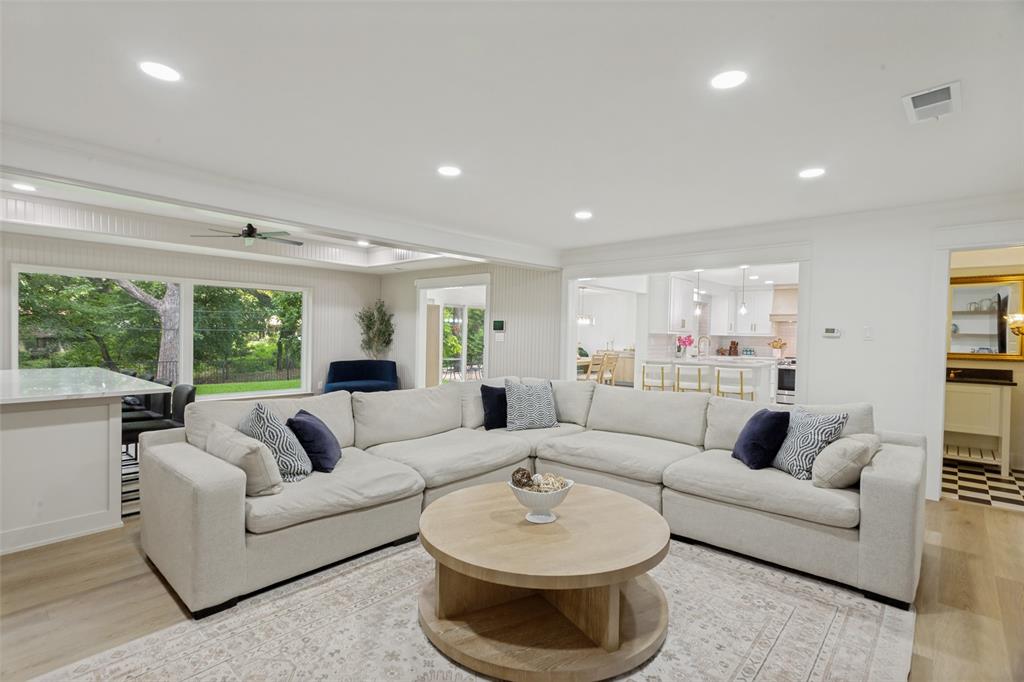 4316 Springbranch Drive Benbrook, TX 76116 - Photo 12 of 39 Spacious living area featuring wood-finish flooring and recessed lighting