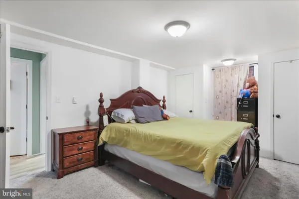 a view of a backyard with sitting area