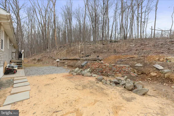 a view of a house with snow on the roof
