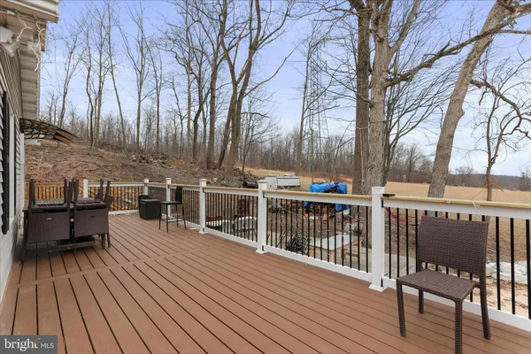 a view of a chairs on a deck
