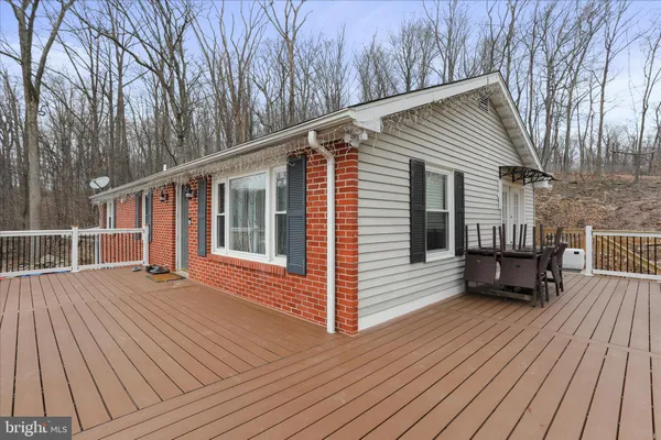 a view of a house with a roof deck