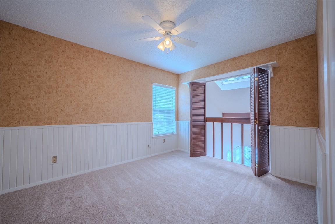 13034 Leader Street, Unit 960 Houston, TX 77072 - Photo 18 of 28 a view of an empty room with a window
