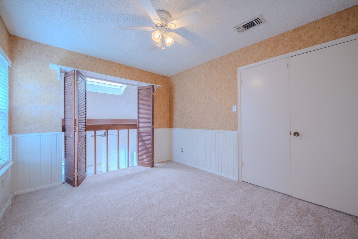 13034 Leader Street, Unit 960 Houston, TX 77072 - Photo 19 of 28 a view of empty room with windows