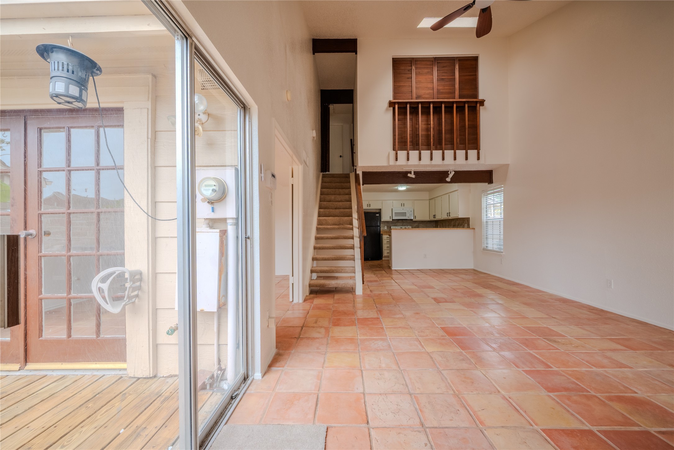 13034 Leader Street, Unit 960 Houston, TX 77072 - Photo 3 of 28 a view of a hallway with wooden shelves and entryway