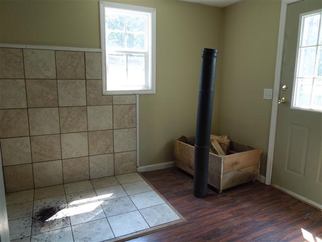 681 Edenway Road Dover, TN 37058 - Photo 18 of 20 Add on room nicely finished to accommodate a wood burning stove.