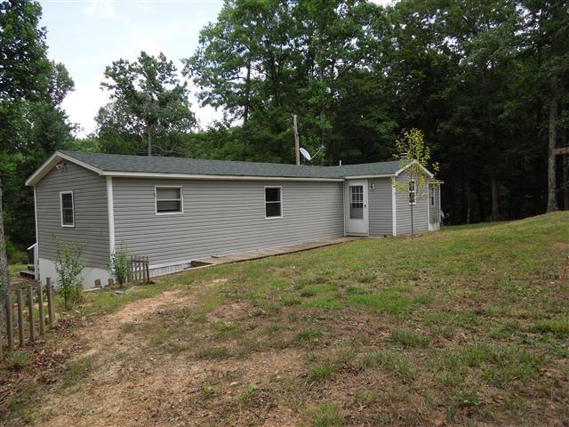 681 Edenway Road Dover, TN 37058 - Photo 3 of 20 Back room add on for the woodburning stove.