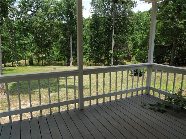 681 Edenway Road Dover, TN 37058 - Photo 6 of 20 Nice covered porch, peaceful view & plenty of deer roaming, as well.