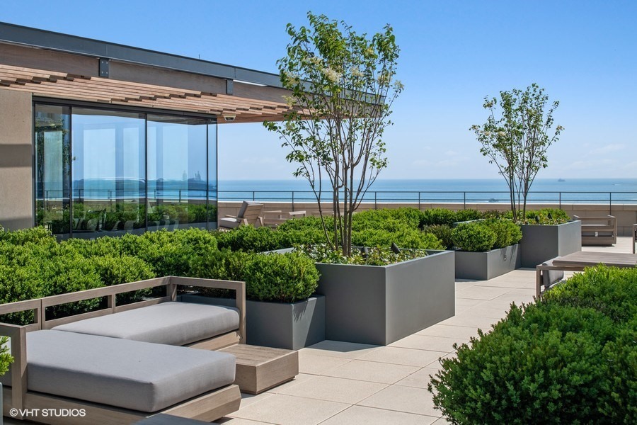 Undisclosed Address Chicago, IL 60610 - Photo 6 of 12 a house view with a garden space