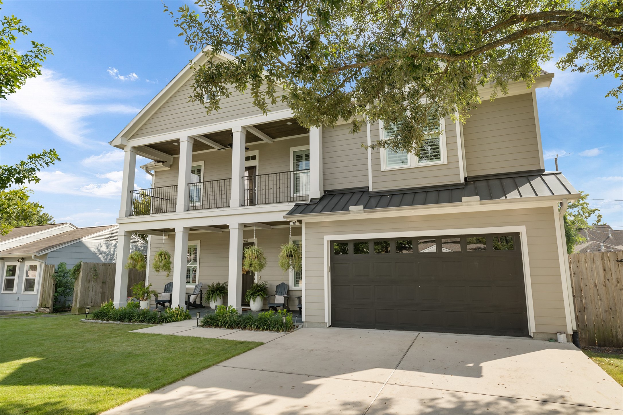 1705 Chippendale Road Houston, TX 77018 - Photo 3 of 50 Another lovely angle of the home's exterior, highlighting its impressive scale and the welcoming feel of the entrance.