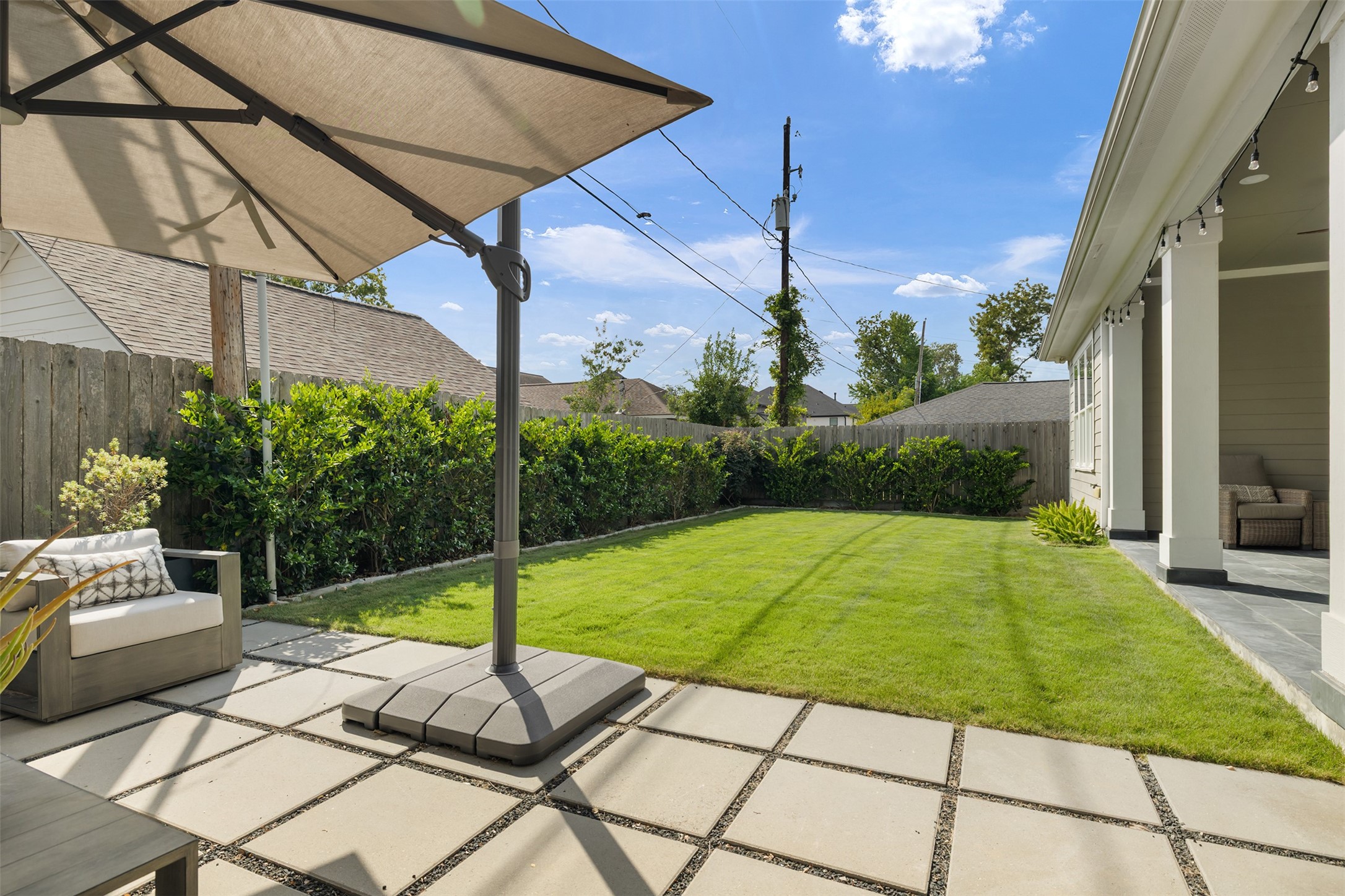 1705 Chippendale Road Houston, TX 77018 - Photo 36 of 50 Step outside and relax! This covered patio is an extension of your living space, ideal for year-round enjoyment.