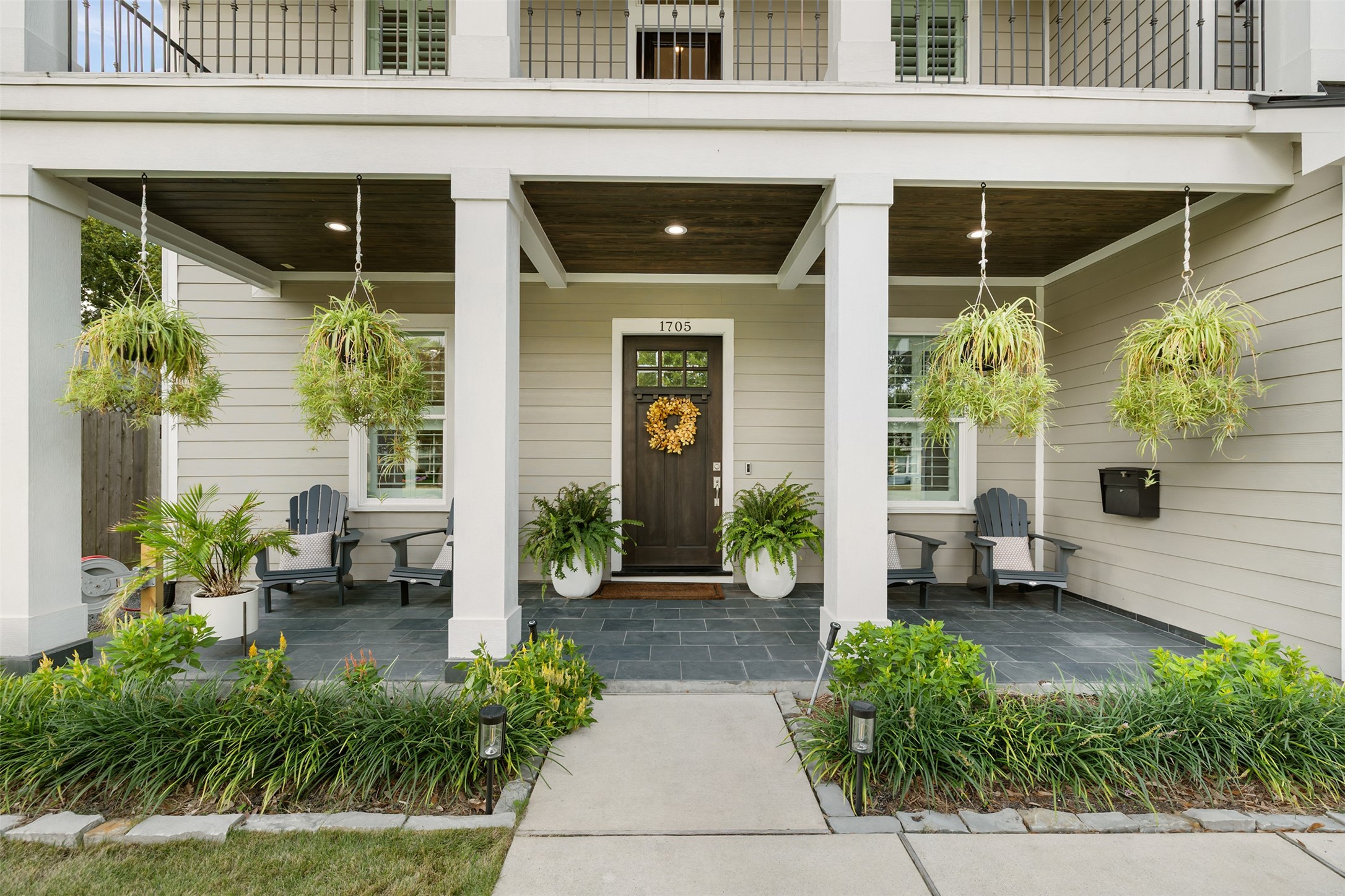 1705 Chippendale Road Houston, TX 77018 - Photo 4 of 50 Step onto the charming front porch! It's the perfect spot for morning coffee or greeting guests before entering through the gorgeous front door.