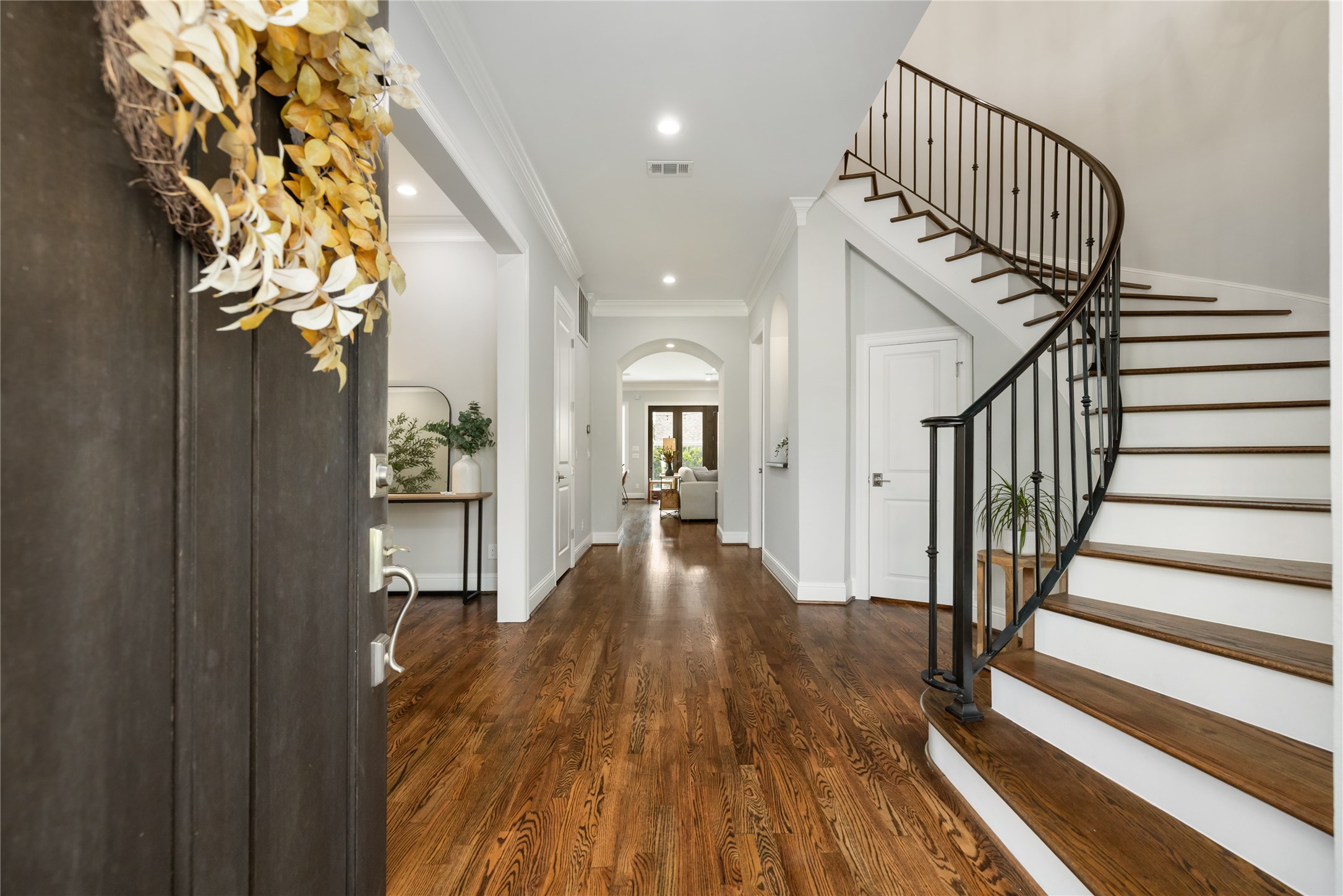 1705 Chippendale Road Houston, TX 77018 - Photo 5 of 50 Prepare to be amazed! The grand two-story foyer and sweeping staircase make an unforgettable first impression. This is truly an elegant entry.