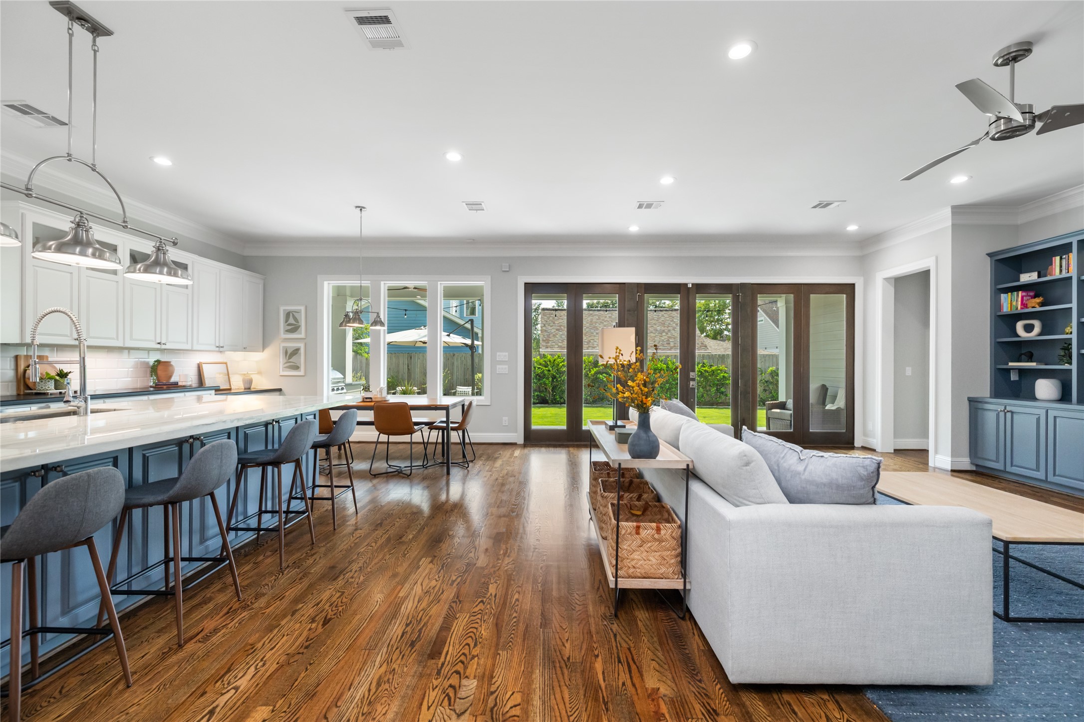 1705 Chippendale Road Houston, TX 77018 - Photo 7 of 50 From this angle, you can appreciate the scale of the island and how effortlessly the kitchen connects to the living spaces.