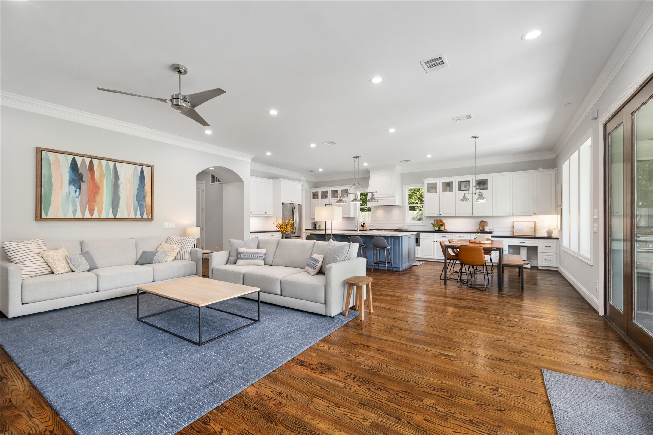 1705 Chippendale Road Houston, TX 77018 - Photo 10 of 50 This open-concept space allows for seamless transitions, making it ideal for large gatherings or quiet family evenings.