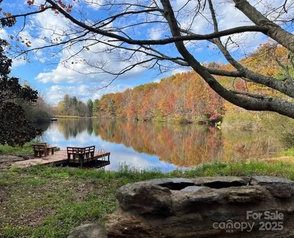 a view of a chair and table in the yard