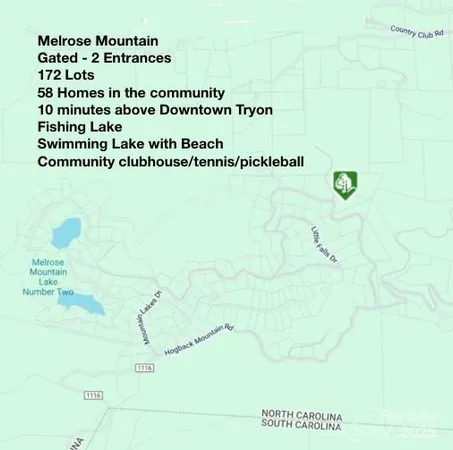 a view of swimming pool from a yard