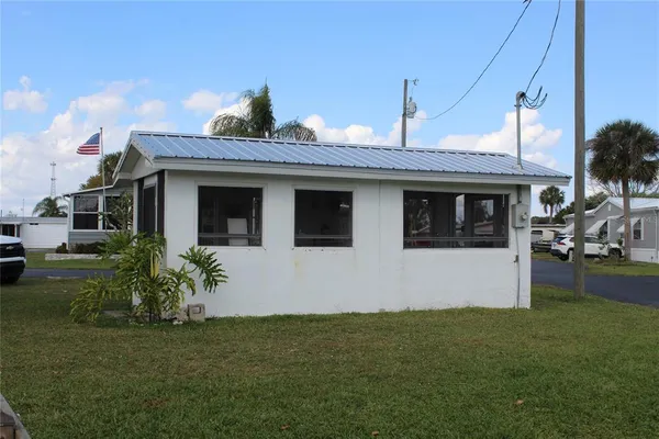 a view of a house with a garden
