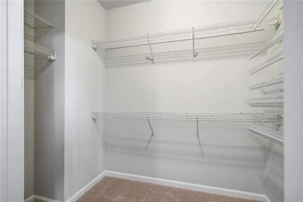 a view of a room with racks on the wall