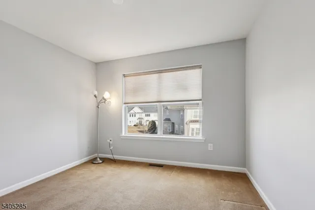 an empty room with window