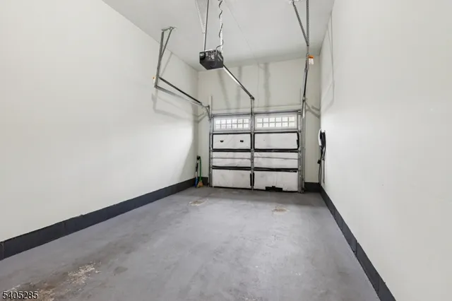 a view of an empty room with stairs