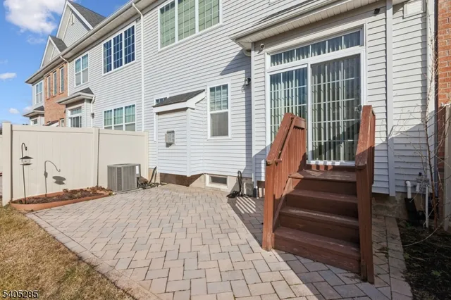 a view of a house with wooden floor and stairs