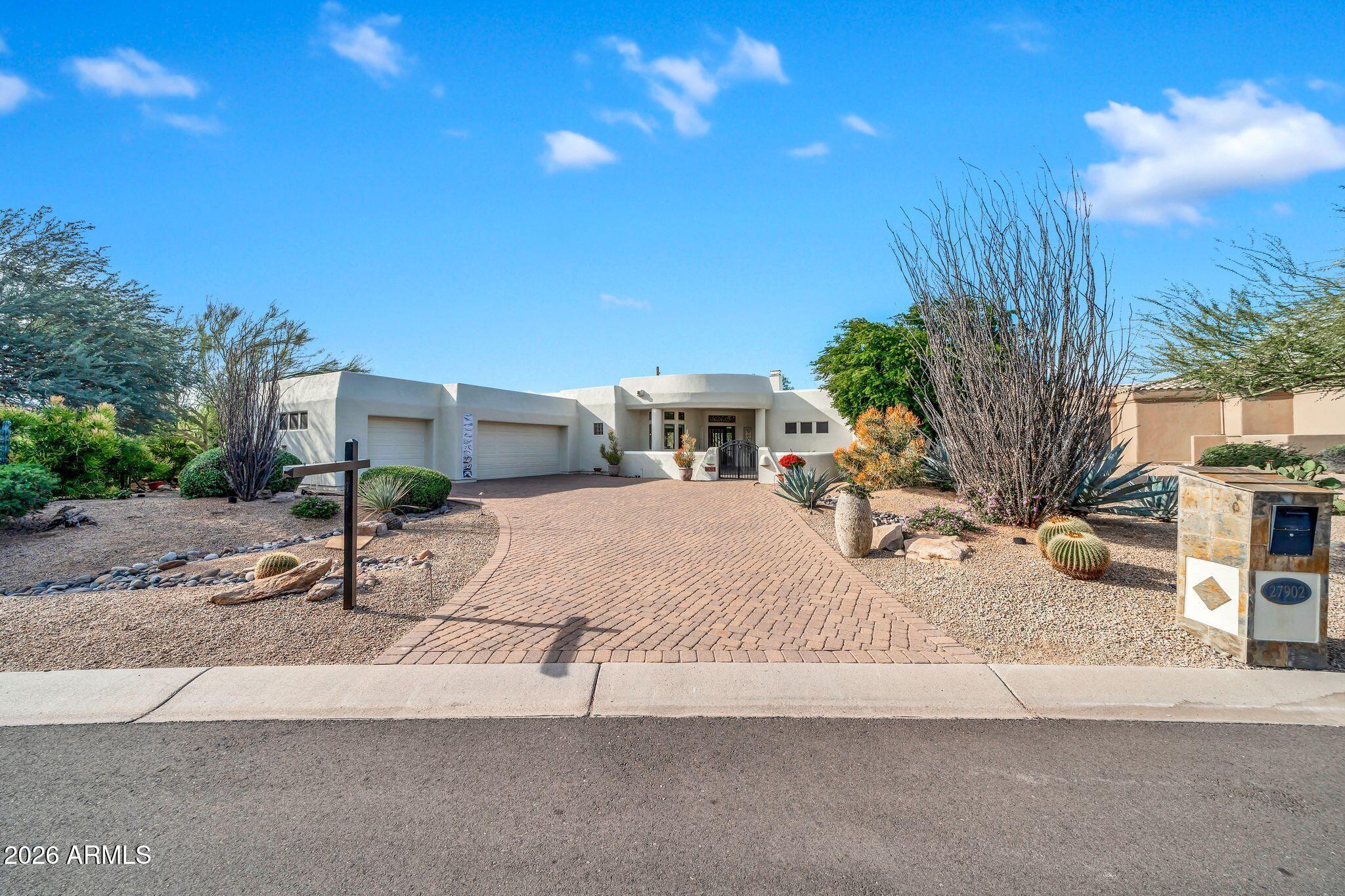 27902 North Agua Verde Drive Rio Verde, AZ 85263 - Photo 4 of 62 a house view with a street