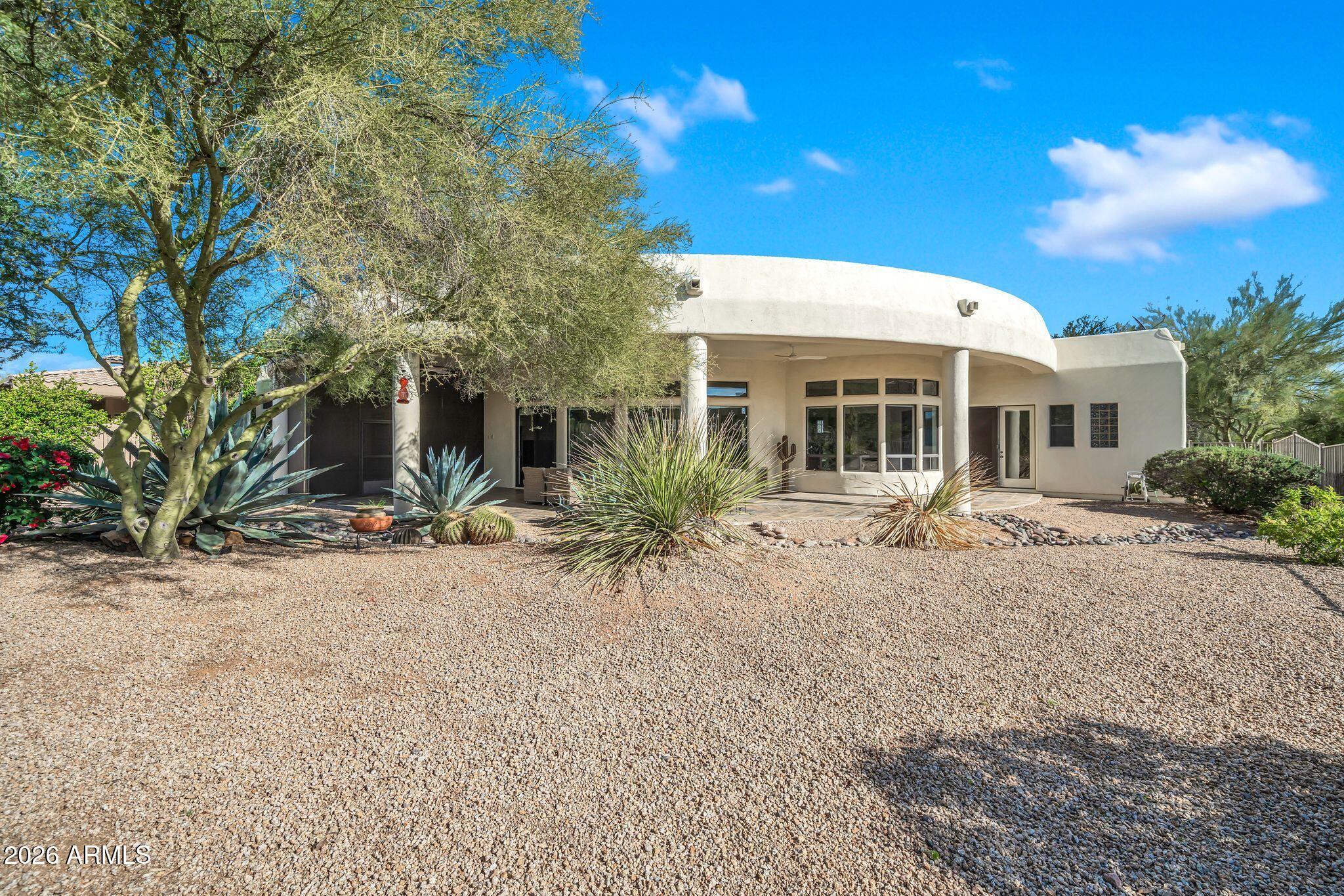 27902 North Agua Verde Drive Rio Verde, AZ 85263 - Photo 54 of 62 a front view of a house with a patio