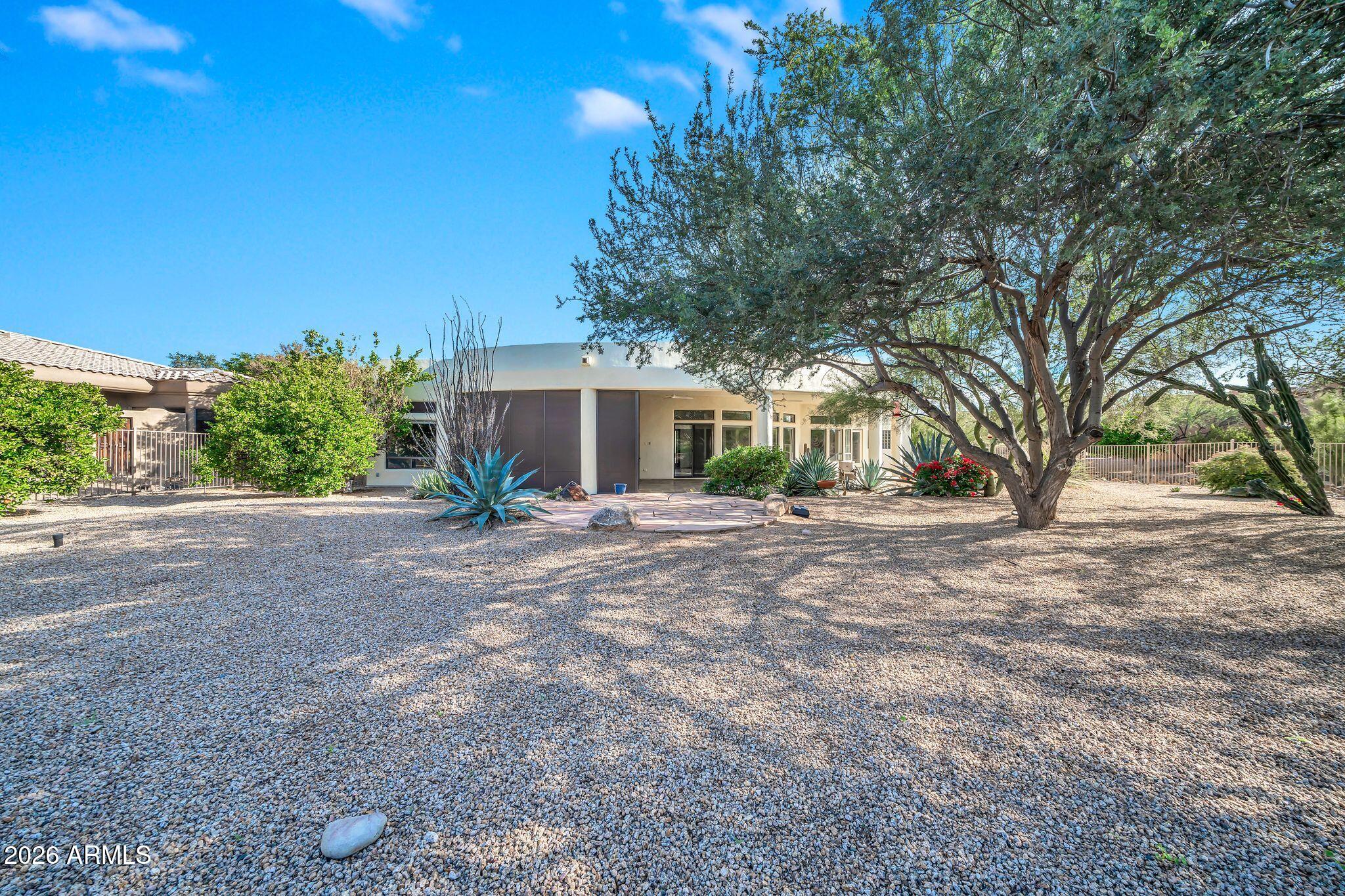 27902 North Agua Verde Drive Rio Verde, AZ 85263 - Photo 56 of 62 a view of a house with a yard and tree s