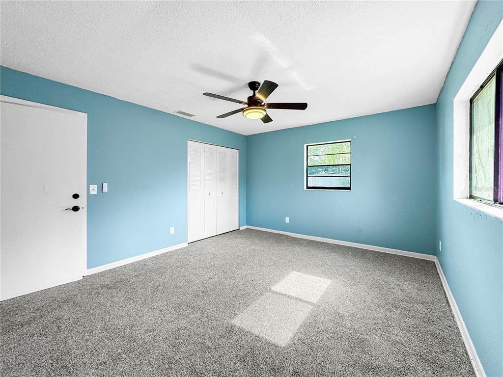 517 3rd Court Southwest Fort Meade, FL 33841 - Photo 15 of 20 a view of a livingroom with a ceiling fan and window