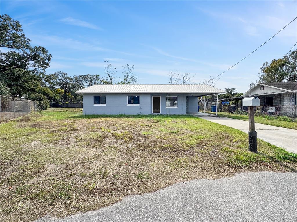 517 3rd Court Southwest Fort Meade, FL 33841 - Photo 5 of 20 a house with swimming pool in front of it