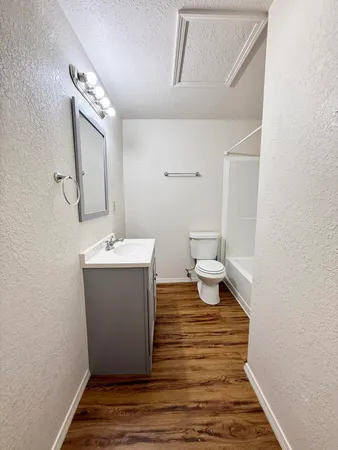 a view of bathroom with a sink and a toilet