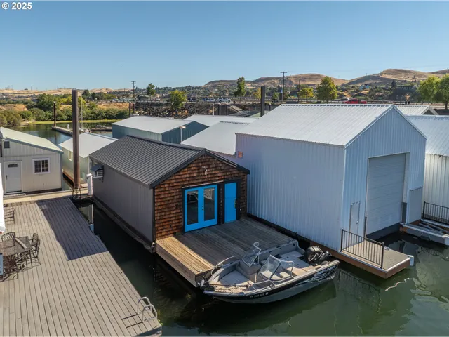a view of a terrace with a table and chairs