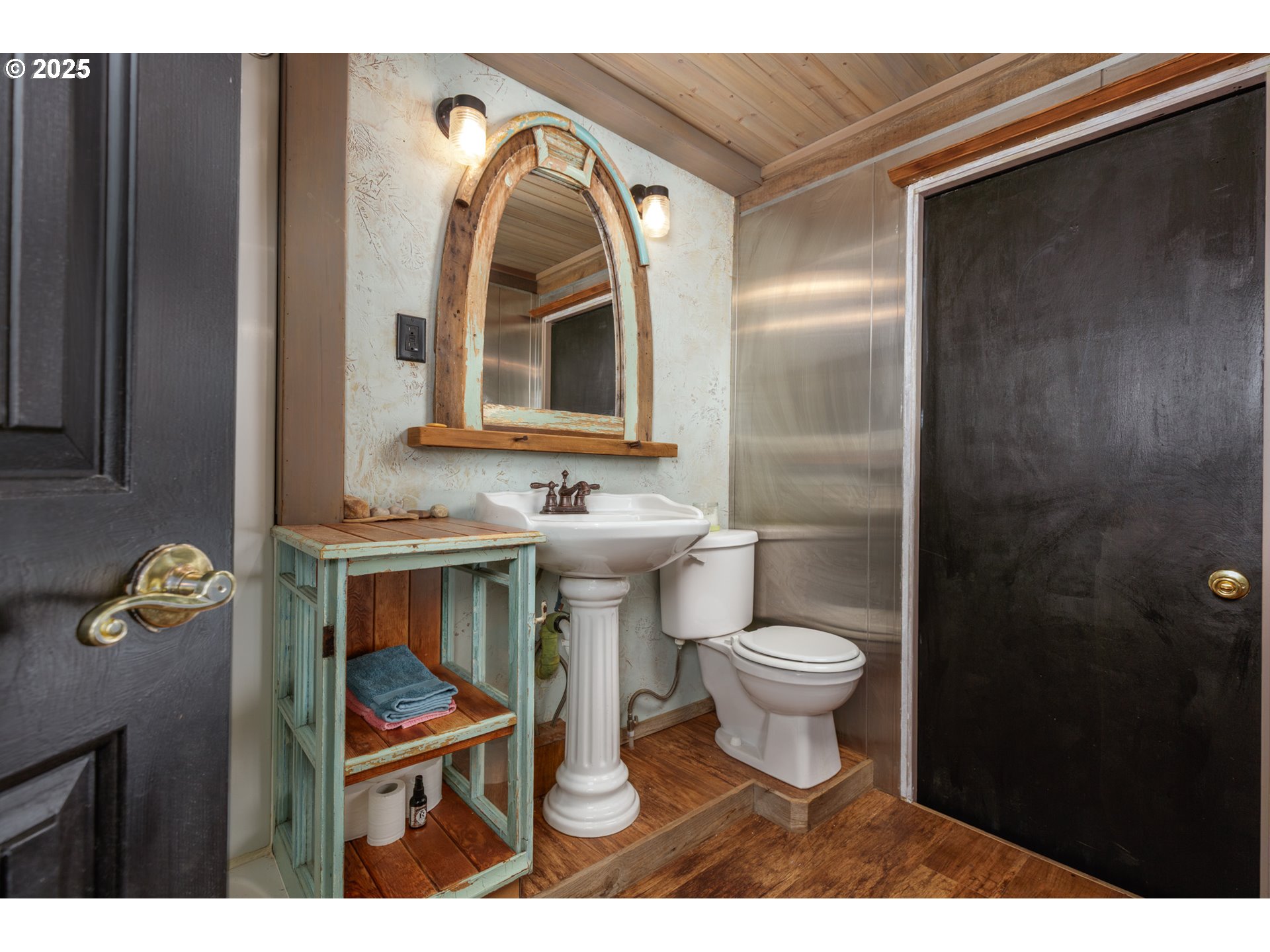101 North Boat Basin Road, Unit A09 The Dalles, OR 97058 - Photo 7 of 17 a bathroom with a toilet a sink and mirror