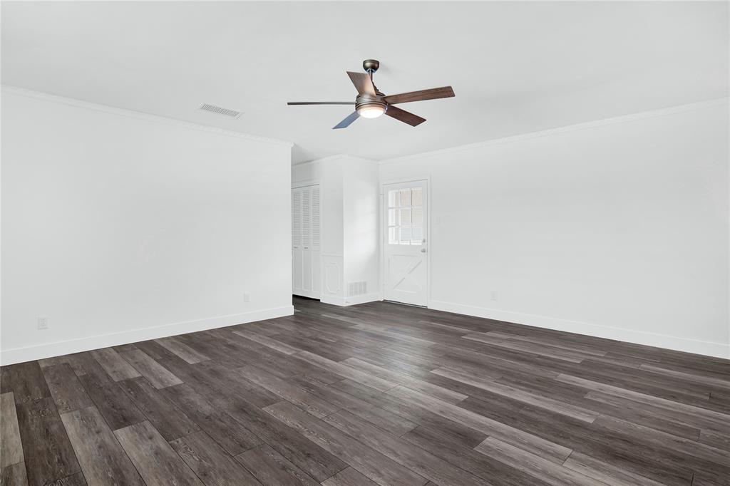 1104 West Lookout Drive Richardson, TX 75080 - Photo 20 of 40 a view of empty room with wooden floor