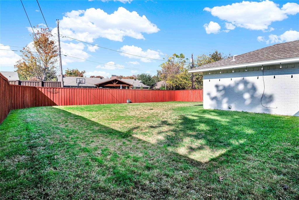 1104 West Lookout Drive Richardson, TX 75080 - Photo 35 of 40 a view of yard with swimming pool and green space