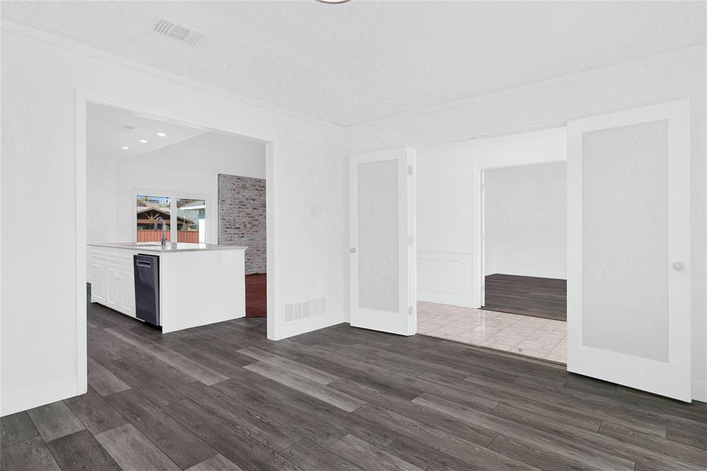 1104 West Lookout Drive Richardson, TX 75080 - Photo 10 of 40 a view of kitchen and wooden floor