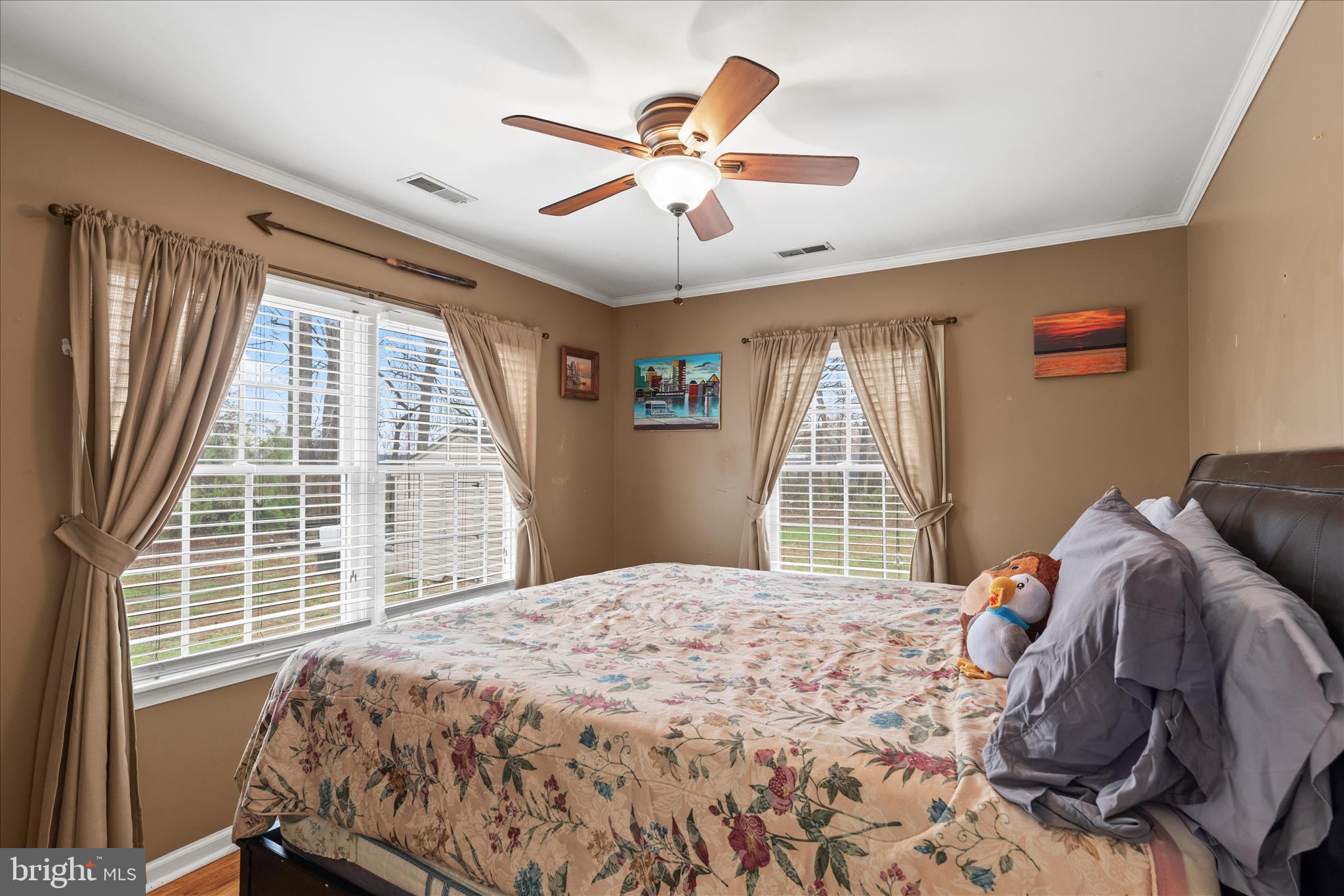 12647 Old Stage Road Bishopville, MD 21813 - Photo 22 of 84 a bedroom with a large bed and a window