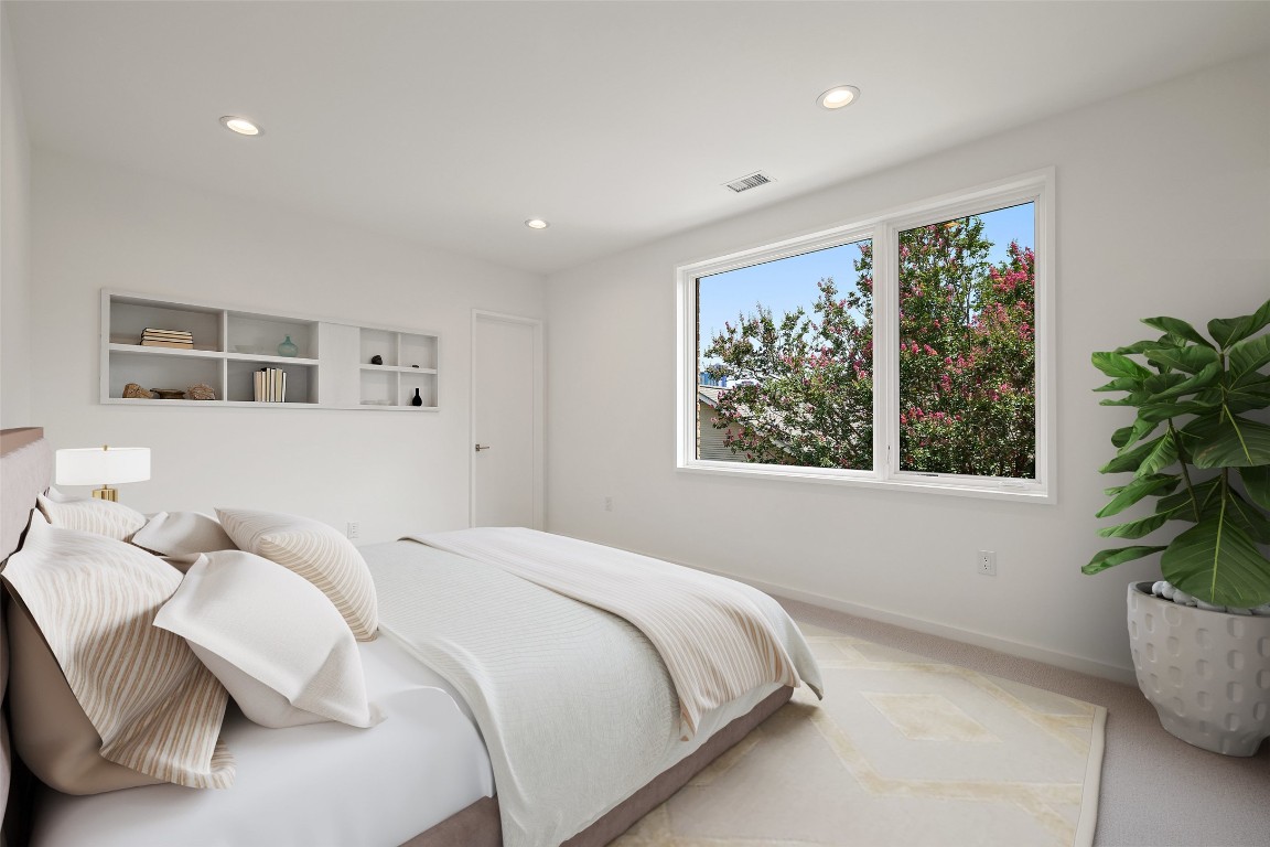 1319 Bonham Terrace Austin, TX 78704 - Photo 20 of 24 Carpeted bedroom with recessed lighting and baseboards