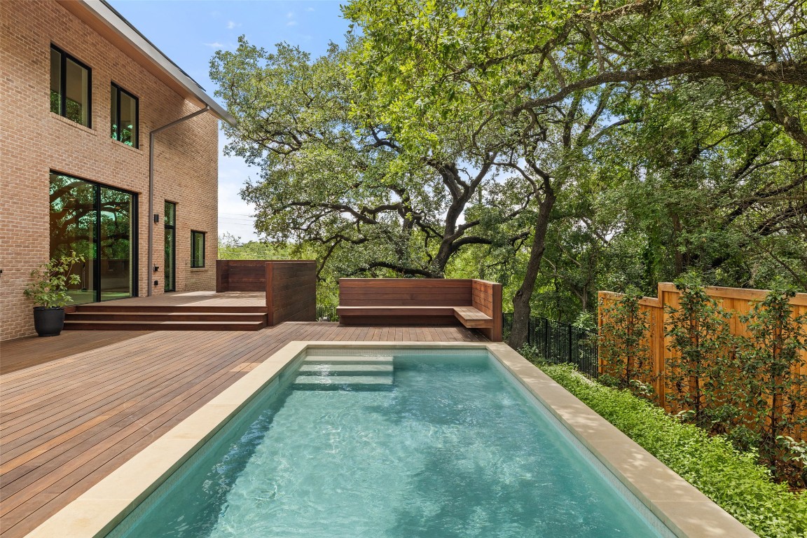 1319 Bonham Terrace Austin, TX 78704 - Photo 24 of 24 View of swimming pool with a deck and a fenced backyard