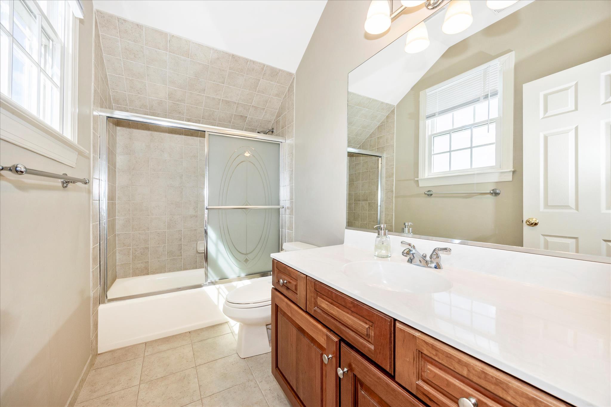 14746 New Windsor Road New Windsor, MD 21776 - Photo 35 of 67 a bathroom with a sink a toilet and shower