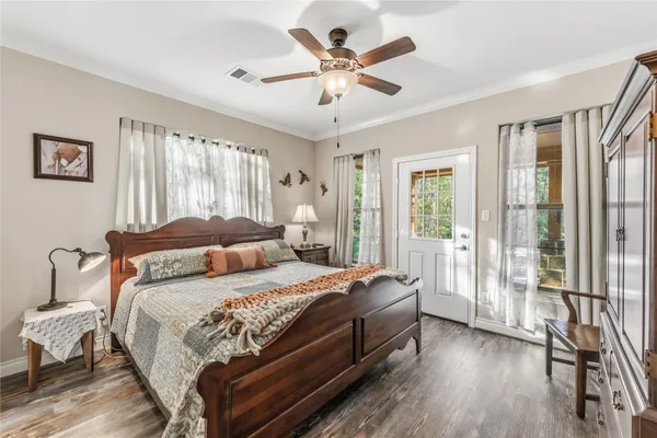 a view of a workspace with furniture and lounge chair