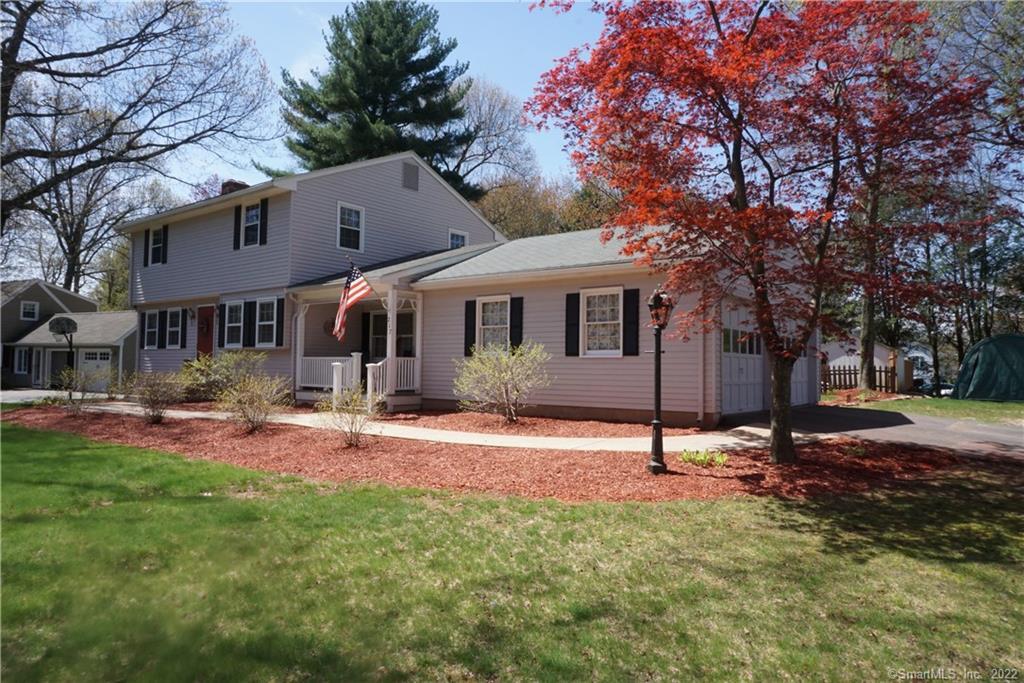 217 Ralph Road Manchester, CT 06040 - Photo 1 of 1 a backyard of a house with table and chairs
