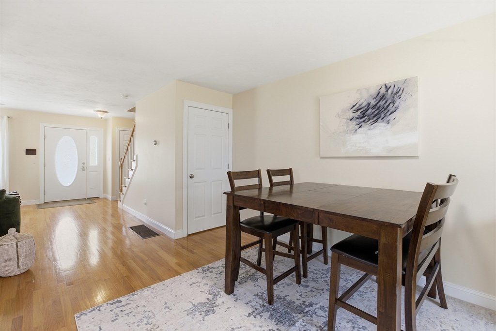 94 Progress Street, Unit 94 Abington, MA 02351 - Photo 11 of 35 a view of a dining room with furniture
