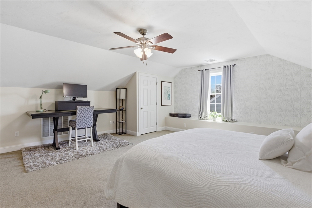 94 Progress Street, Unit 94 Abington, MA 02351 - Photo 26 of 35 a bedroom with a bed a desk and chair