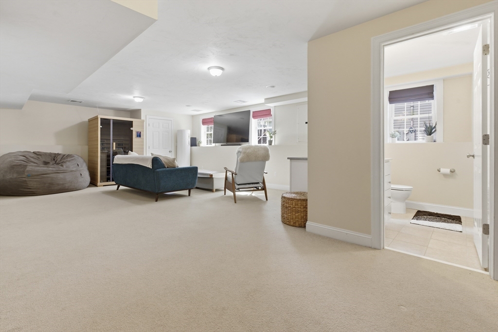 94 Progress Street, Unit 94 Abington, MA 02351 - Photo 27 of 35 a living room with furniture and a large window